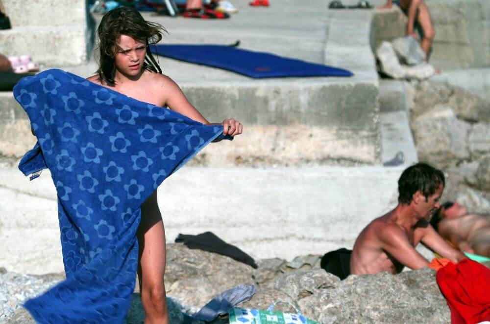 Nudist Rocky Family Angle - Seeks harmony with the rhythms of nature and the environment through nudity