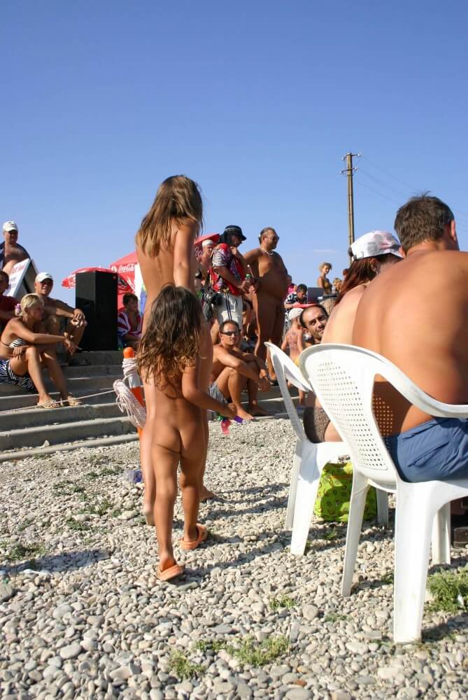 Naturist Standing Sideline - Peace and tranquility are goals for those who choose nudism and naturism