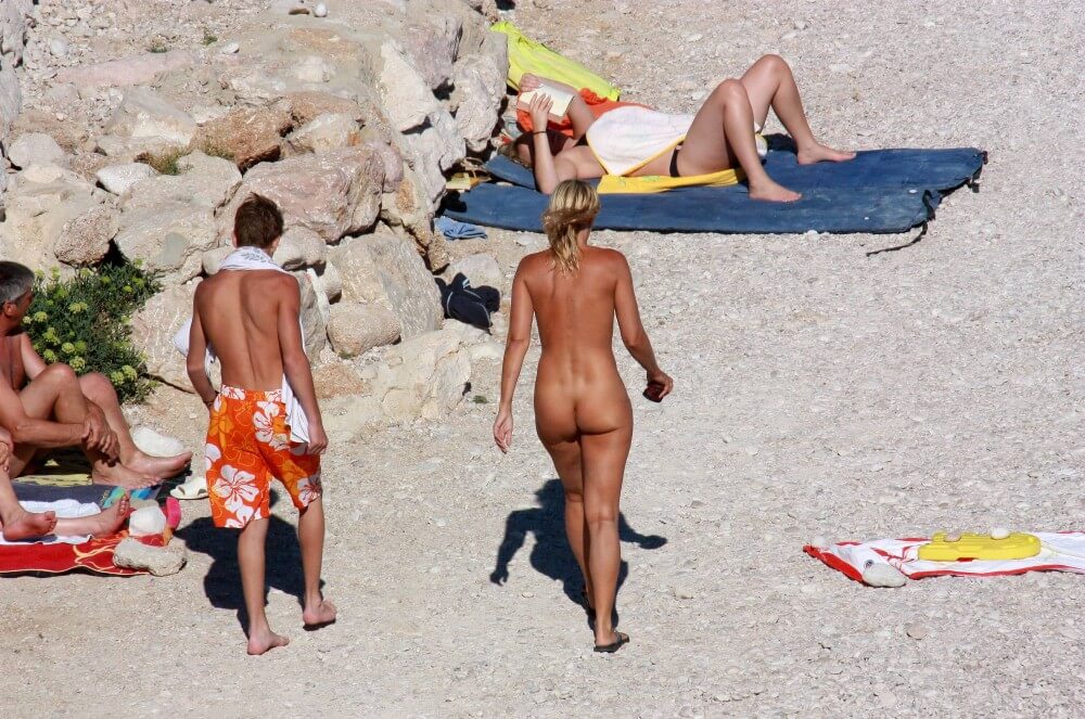 European Beach Entrance pics - Blending in with the crowd of nudists