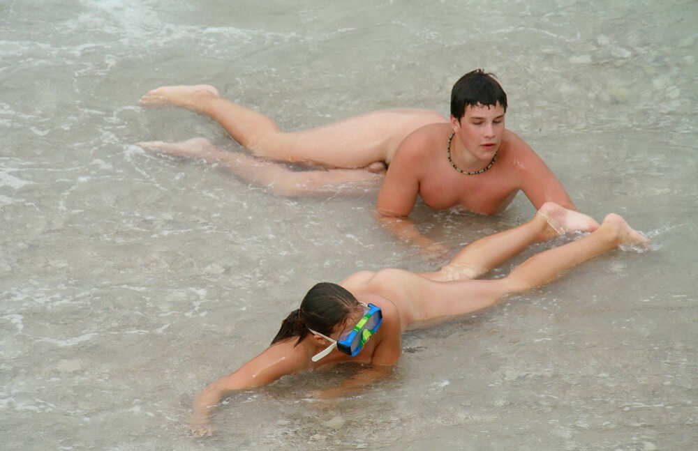 Wading In The Shallows pics - Nudism strengthens friendships and mutual respect