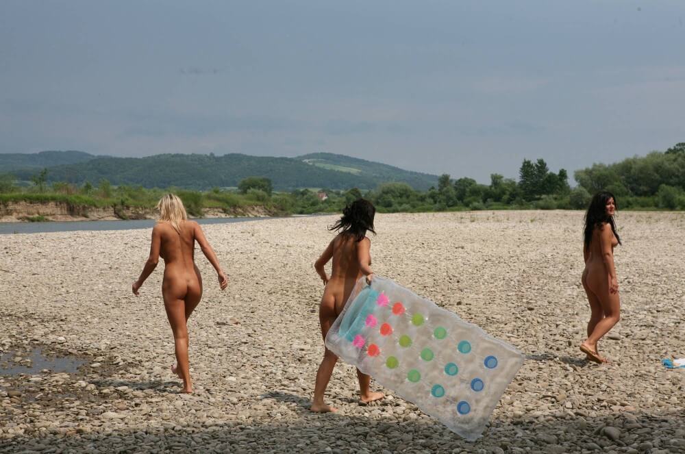 Naturist Park Floating On River photos - Nudity is perceived as part of natural existence and the beauty of life