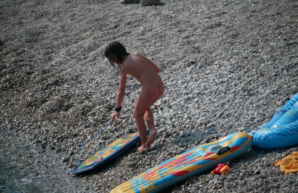 Naturist Surf Board Glides pics - The first step toward home nudism