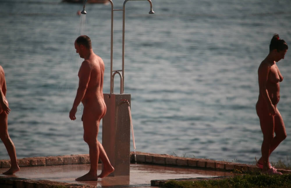Naturist Shower at Dusk pics - Popularizing nudism among the general public