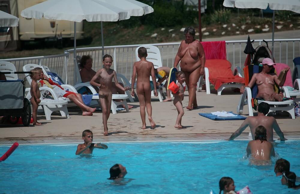 Naturist Afternoon Pool Games pics - Freedom and naturalness are important to naturists
