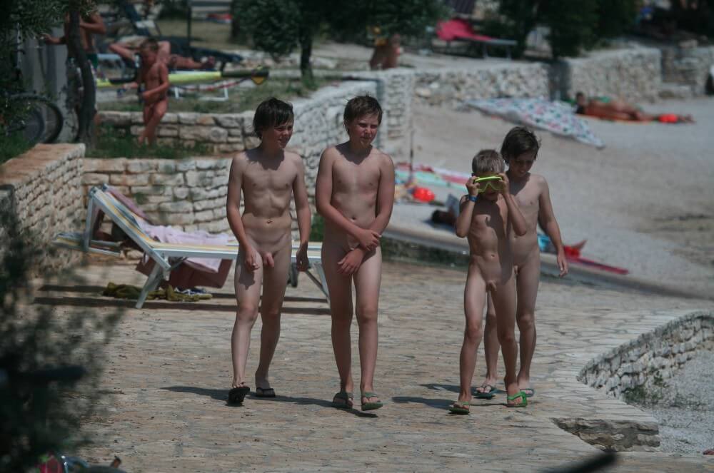 Shore walking nude - Nudism fosters trust and mutual understanding