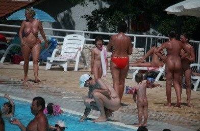 Enjoying The Sunny Pool gallery - The practice of nudism helps overcome insecurities and overcome fears