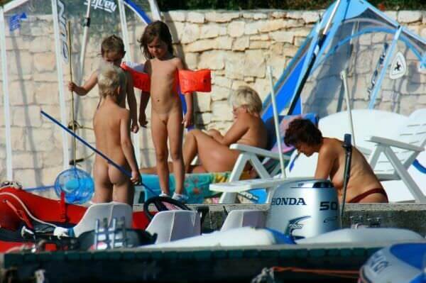 By the boat photos - Nudism and Respect for Nature and the Environment