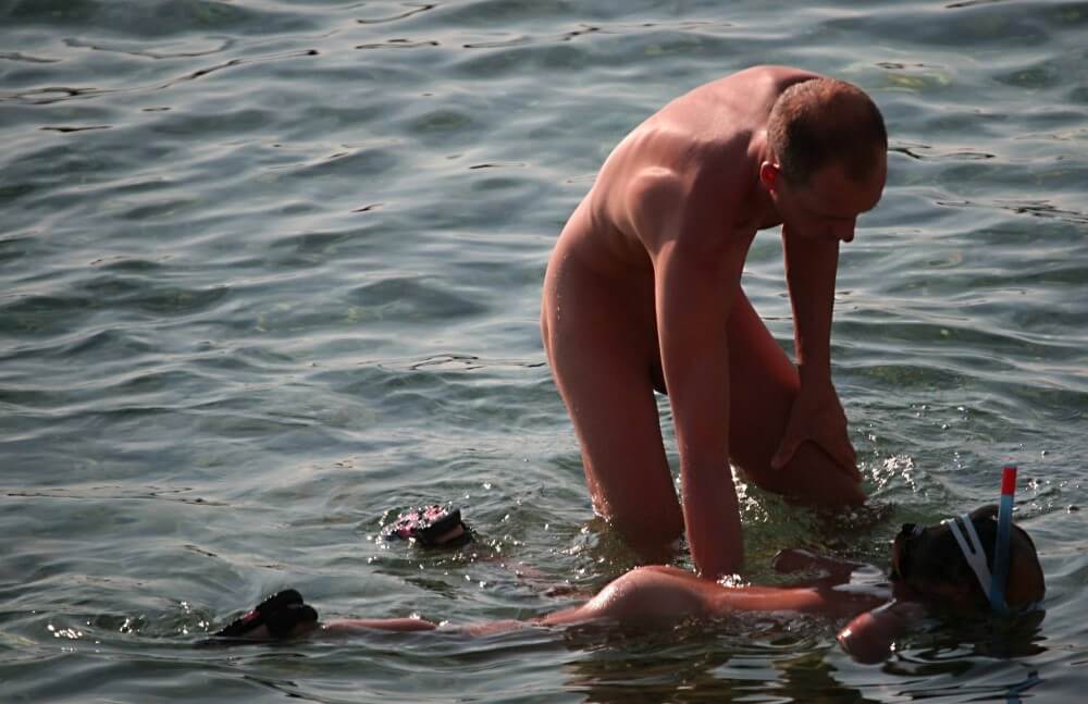 Father Floats His Daughter pics - Nudism knows no boundaries